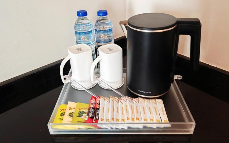 Zenith Hotel Kuantan Kültér fotó A kettle and tea bags in a hotel room